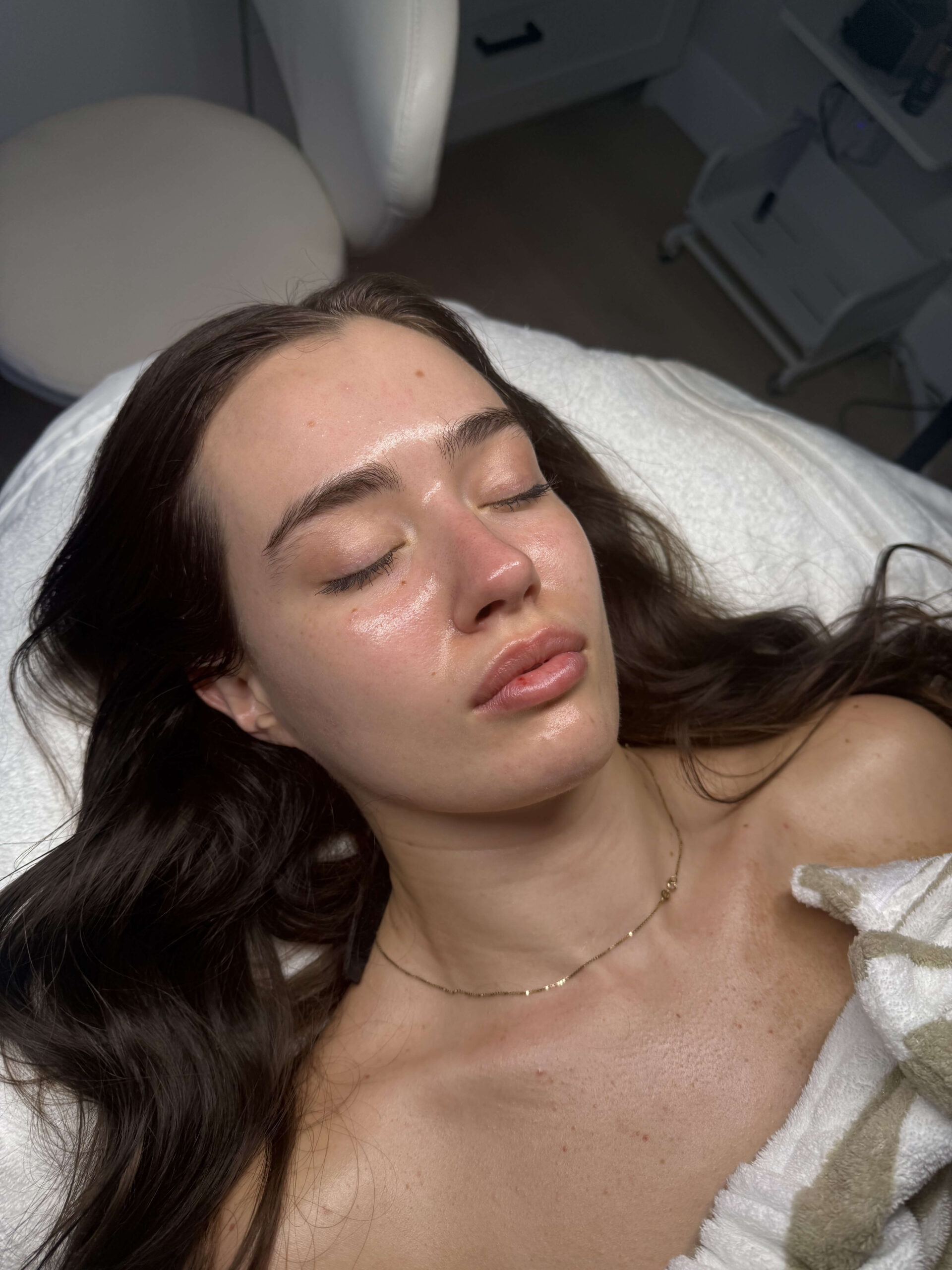 Woman receiving relaxing esthetician services